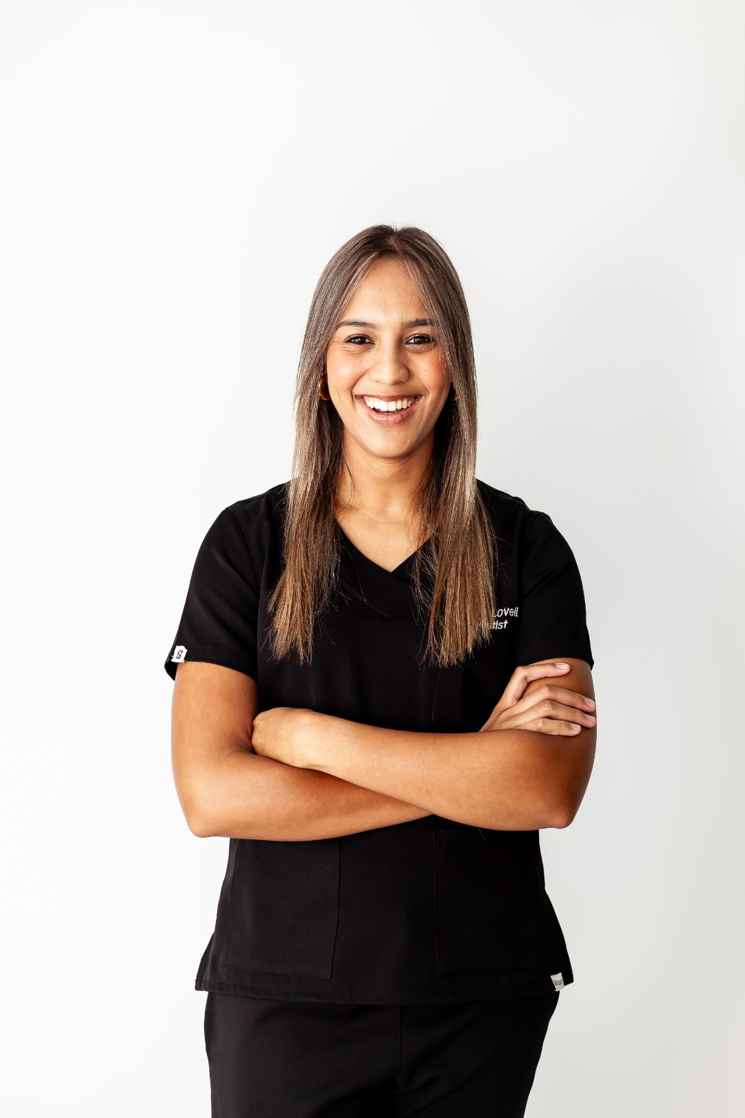 Dr Natalie Lovell portrait with folded arms